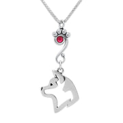 Sterling Silver Akita Birthstone Necklace, A Paw Print Charm Holder accented by a ruby red Swarovski crystal that holds a handcrafted Akita pendant all suspended from a sterling silver box chain.