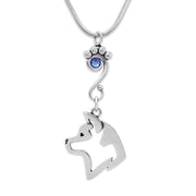 Sterling Silver Akita Birthstone Necklace, A Paw Print Charm Holder accented by a sapphire blue Swarovski crystal that holds a handcrafted Akita pendant all suspended from a sterling silver snake chain.