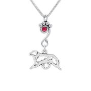 Sterling Silver Australian Shepherd Birthstone Necklace. A versatile box chain showcases a ruby red Swarovski crystal accented paw print charm holder with a handcrafted Australian Shepherd charm, designed to breed standard.