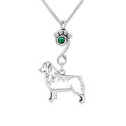 Sterling Silver Australian Shepherd Birthstone Necklace. A versatile box chain showcases an emerald green Swarovski crystal accented paw print charm holder with a handcrafted Australian Shepherd charm, designed to breed standard.