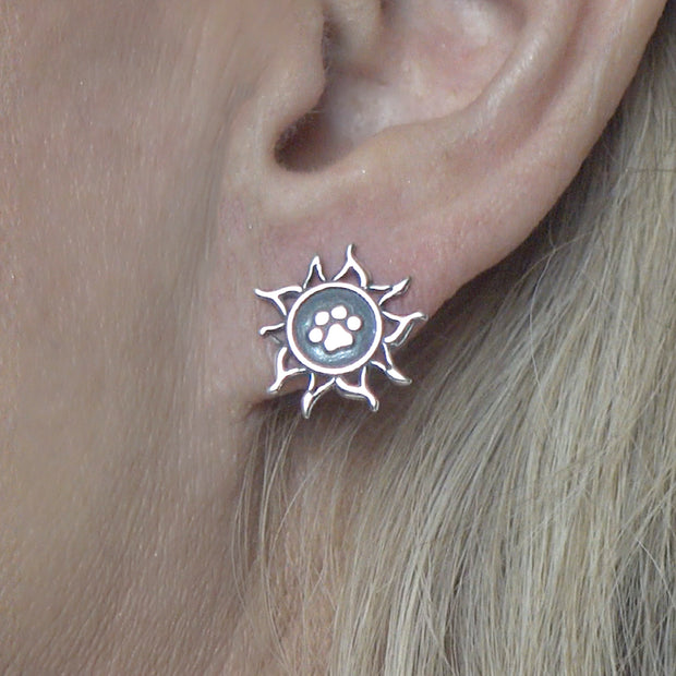 Paw Print and Sun Post Earrings in Sterling Silver on Model.