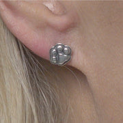 Paw Print Post Earrings in Sterling Silver on Model.