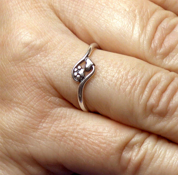 Paw Print and Heart Ring in Sterling Silver on Model.