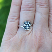 Paw Print with Heart Scroll Ring in Sterling Silver on Model.