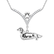 Longhaired Dachshund Necklace Body Design with Badger in V-Shaped Cubic Zirconia and Sterling Silver Chain with Pawprint.